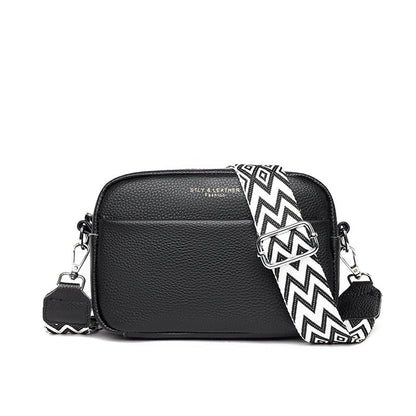 Caliara - kornat läder crossbodyväska